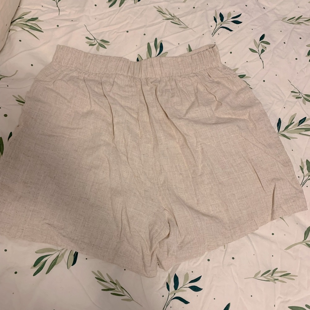 High waisted linen shirts. Size medium.